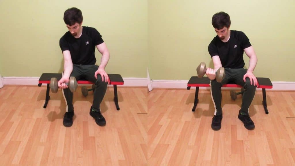 A man doing a dumbbell wrist flexion on his knee