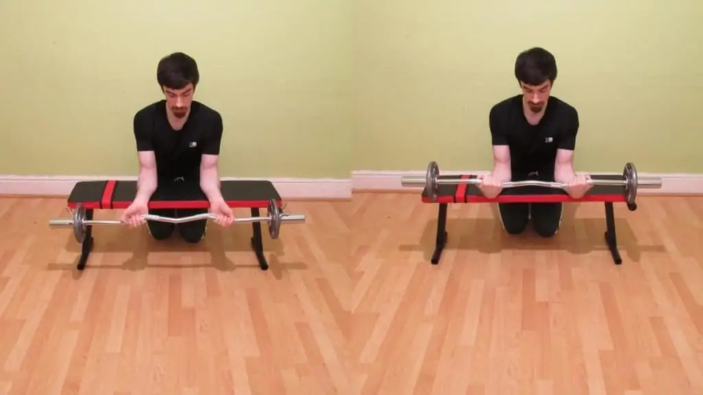 A man performing an easy curl bar wrist curl