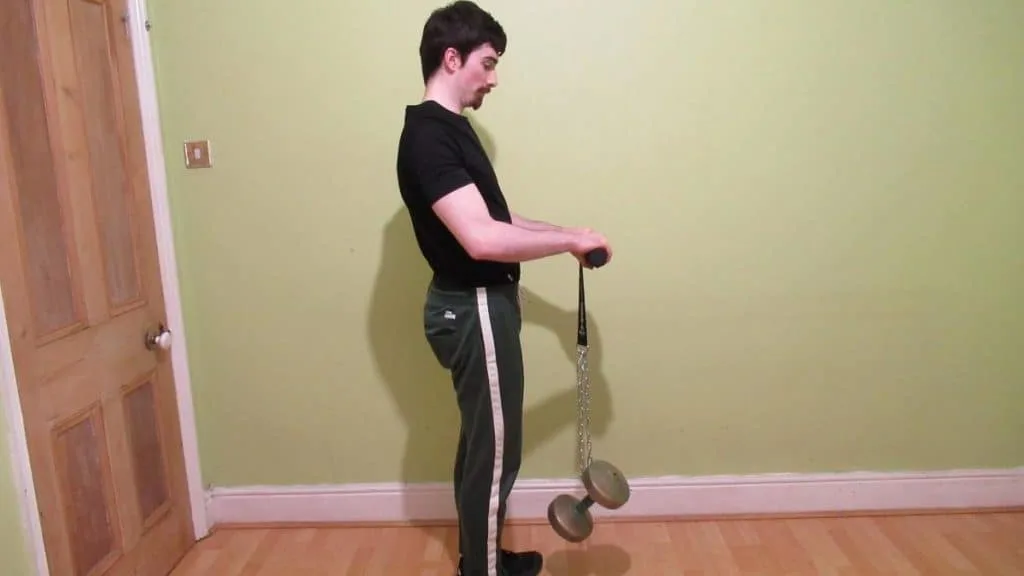 A man working out with his forearm blaster