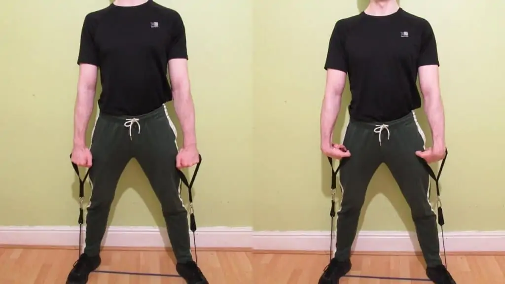 A man performing some forearm resistance band exercises