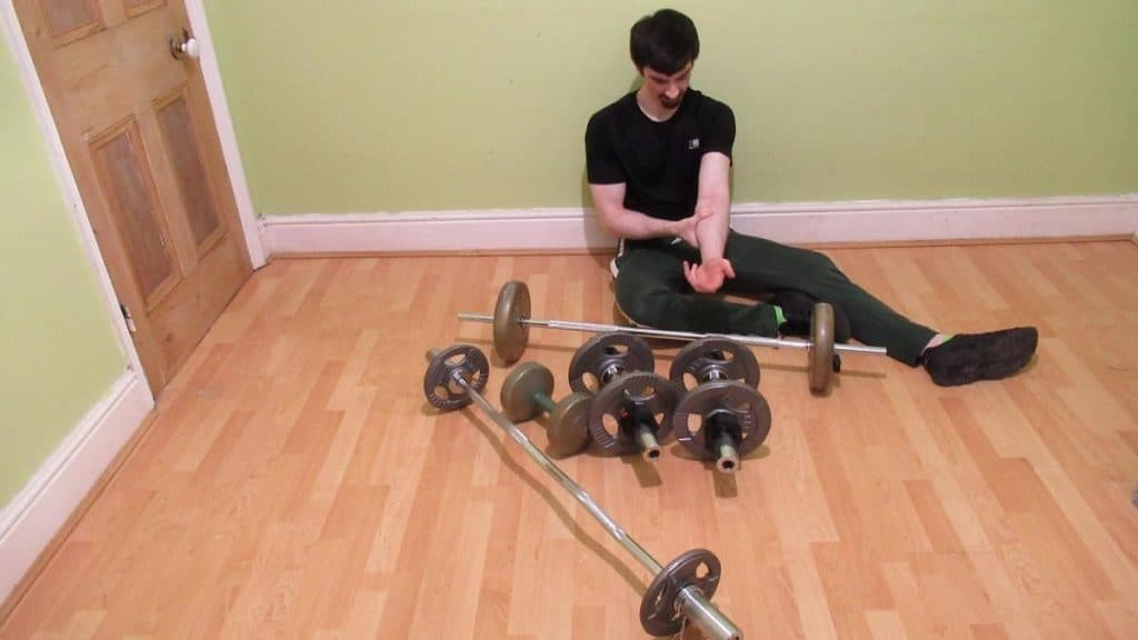 A man with forearm splints from lifting weights