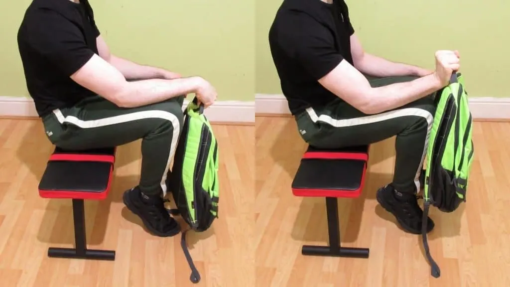 A man performing a forearm workout with his backpack