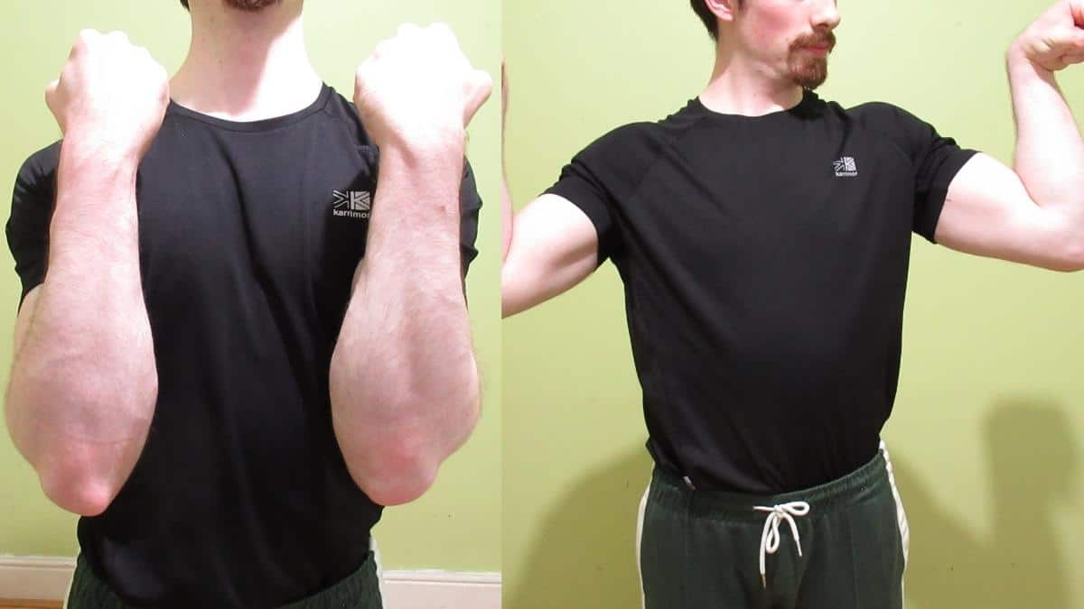 A man showing that his forearms are bigger than his biceps