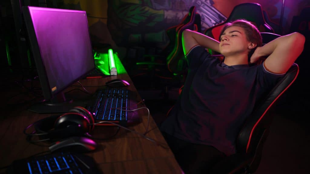 A gamer resting in his chair