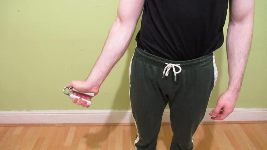 A man demonstrating how to get veiny forearms