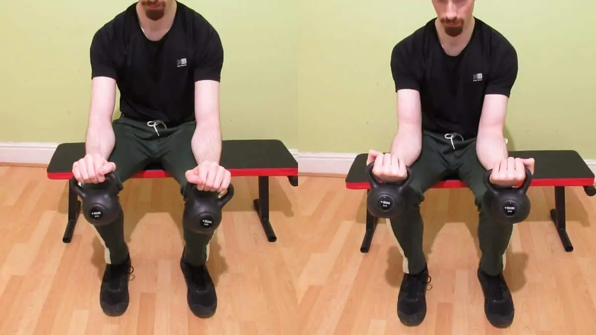 A man doing some kettlebell forearm exercises during his workout