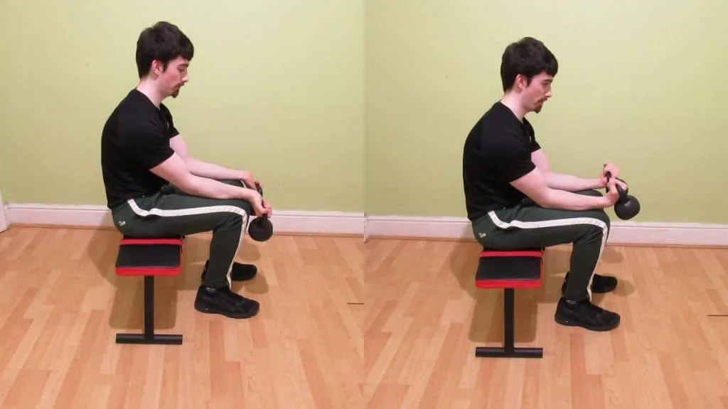 A man doing some exercises during his kettlebell forearm workout