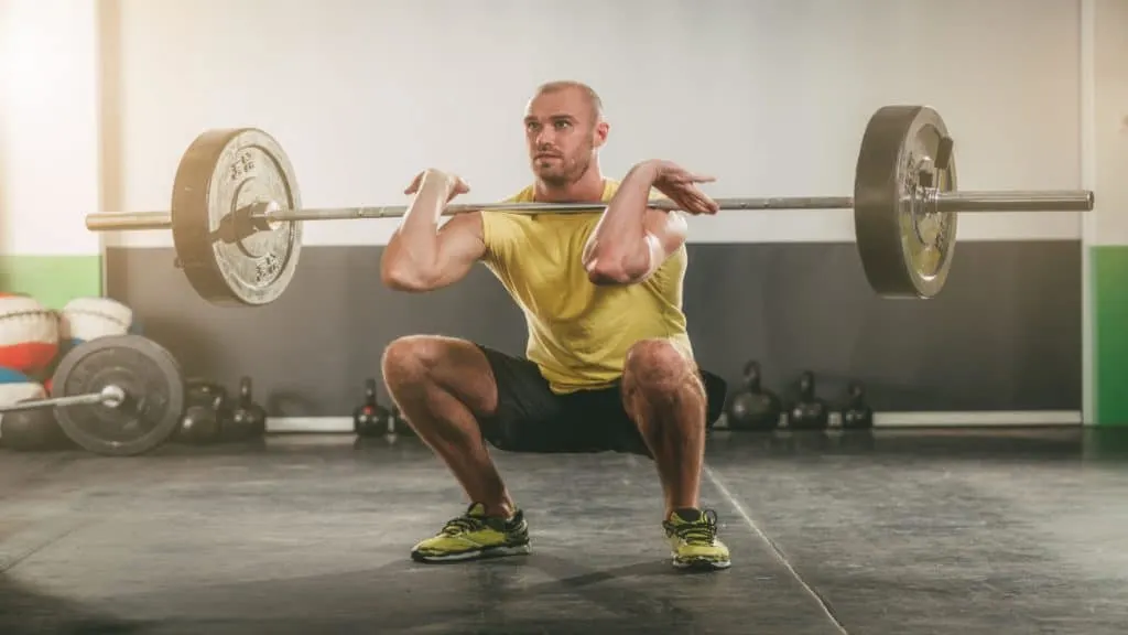 A man doing a front squat