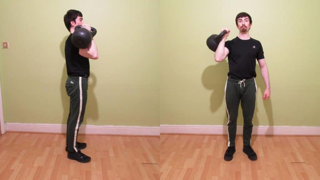 A man holding his kettlebell
