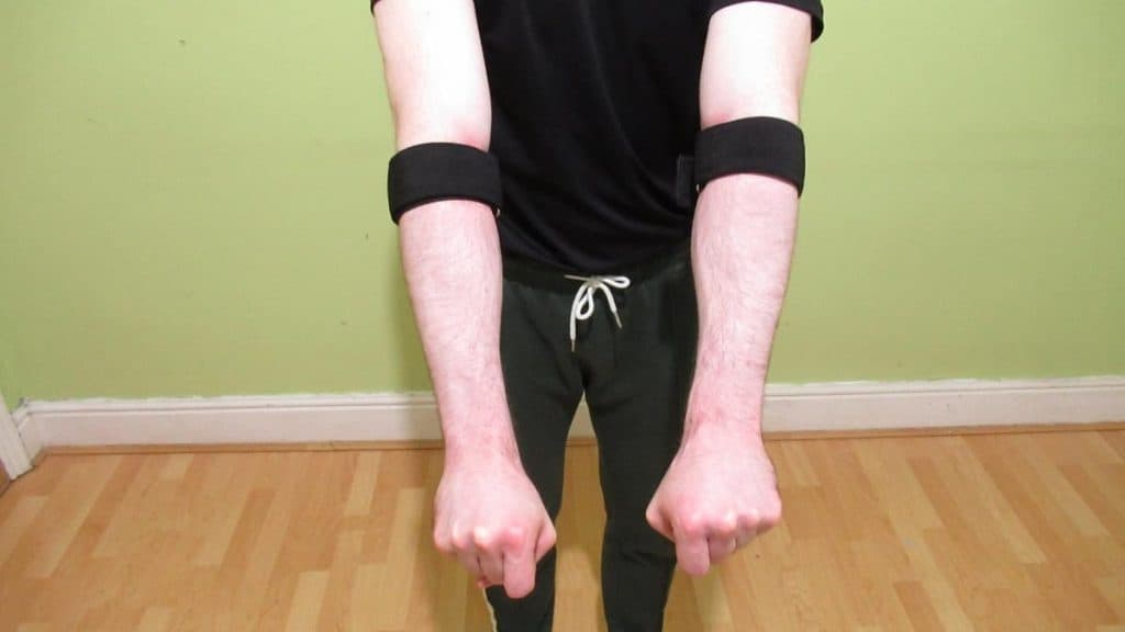A man performing some occlusion training for his forearms