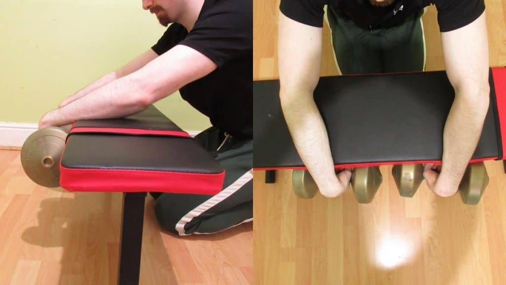 A man making a common palms down wrist curl mistake; overstretching the wrists