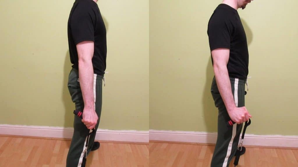 A man performing a resistance band front rotation