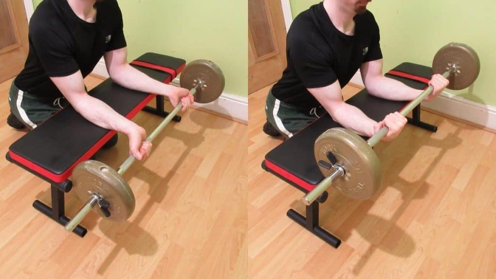 A man performing seated barbell wrist curls for his forearms