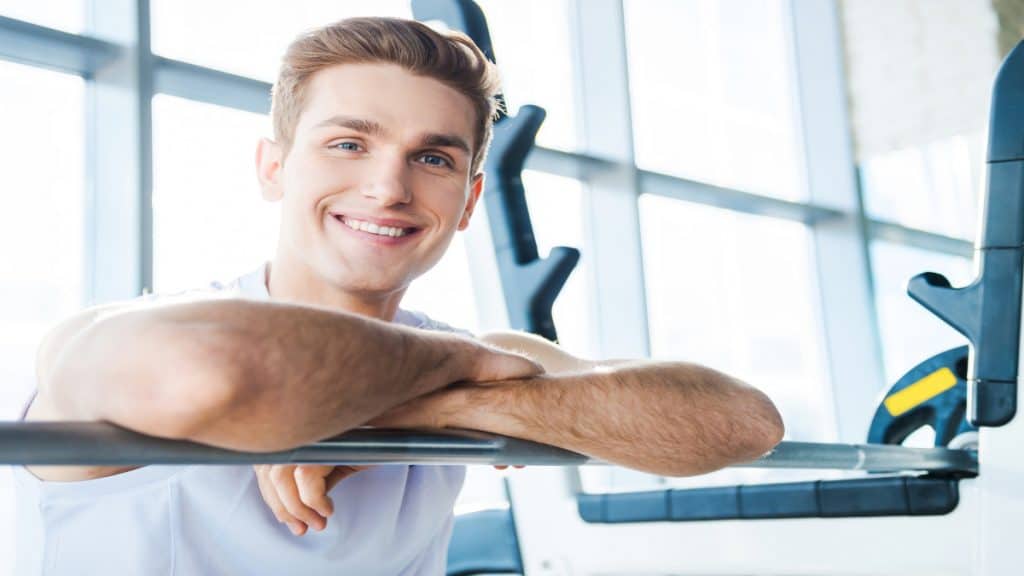 A smiling man at the gym