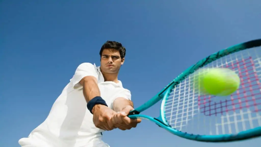 A tennis player hitting a ball