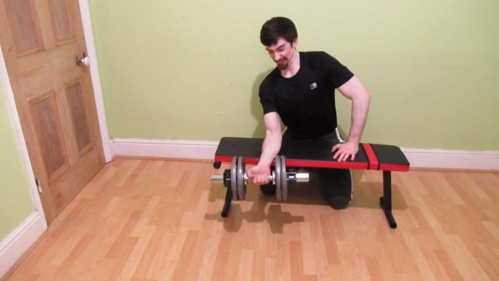 A man showing how you can gain strength by training your forearms everyday