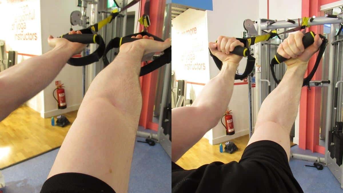 A man doing some TRX forearm exercises during his workout