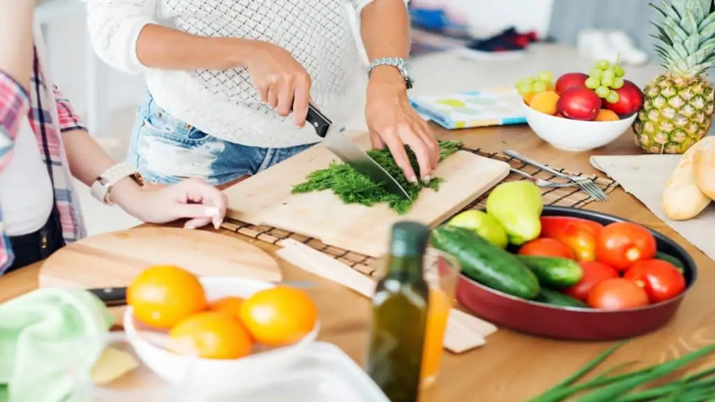 A woman preparing some healthy food