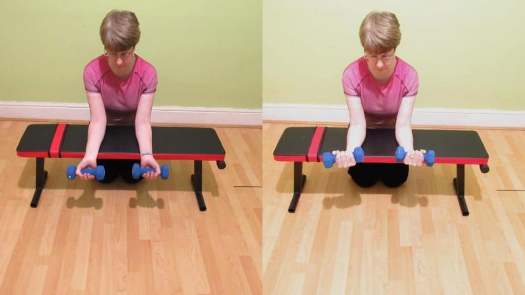 A woman doing a wrist curl for her forearms
