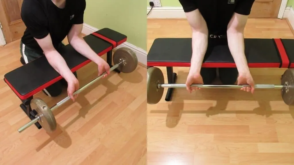 A man doing wrist curls with a barbell