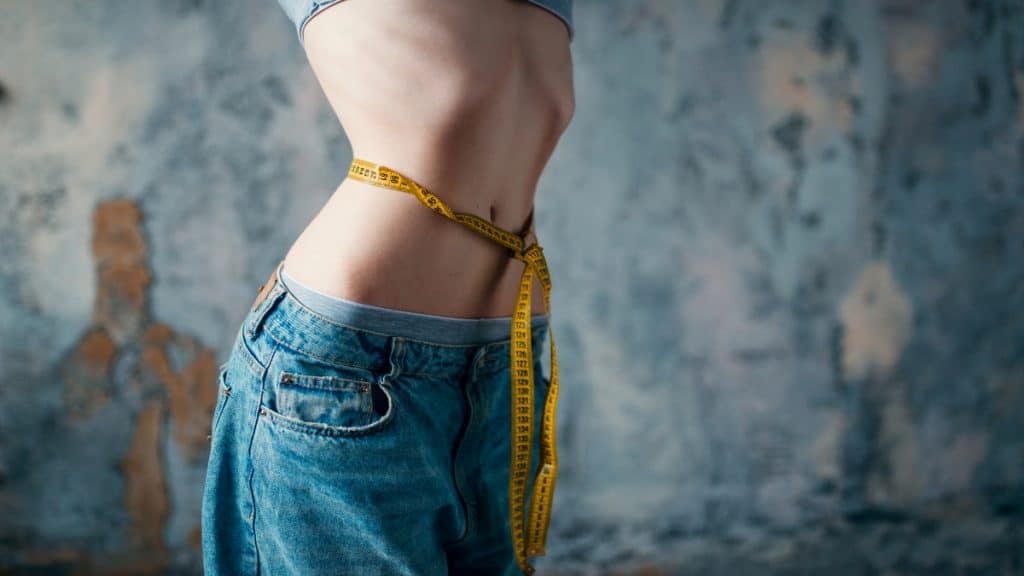 Close up of a woman's 16 inch waistline