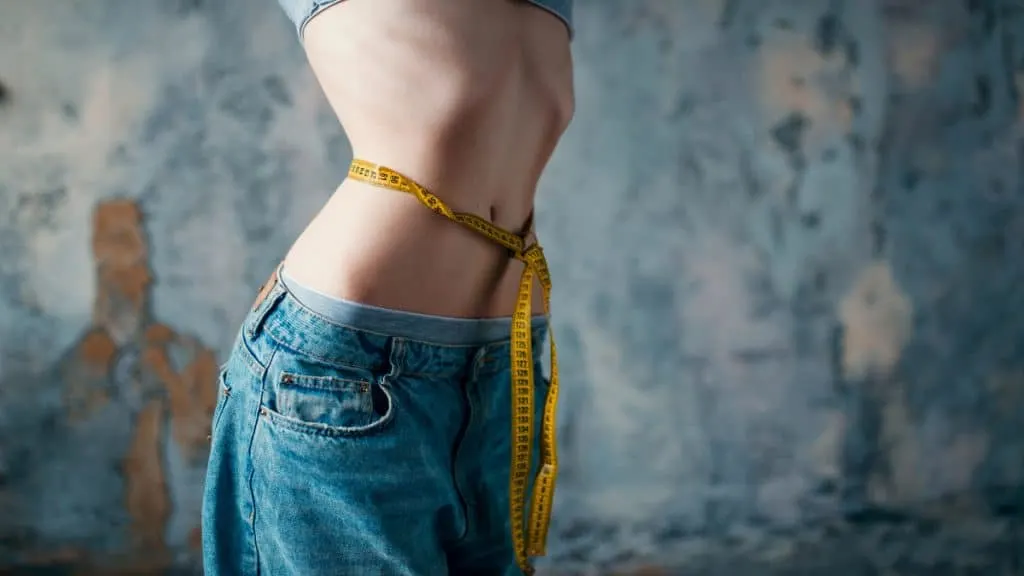 Close up of a woman's 16 inch waistline