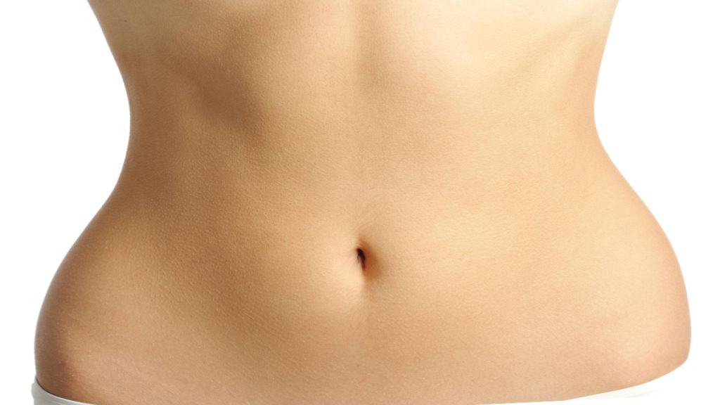 Close up of a woman's 27 inch waist