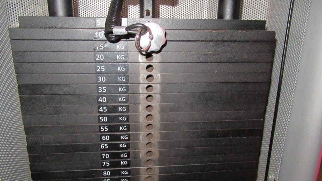 A cable weight stack at the gym