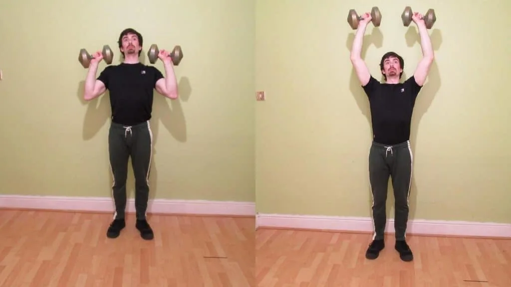 A man doing a dumbbell shoulder press