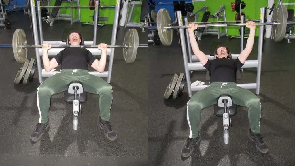 A man doing an incline barbell press