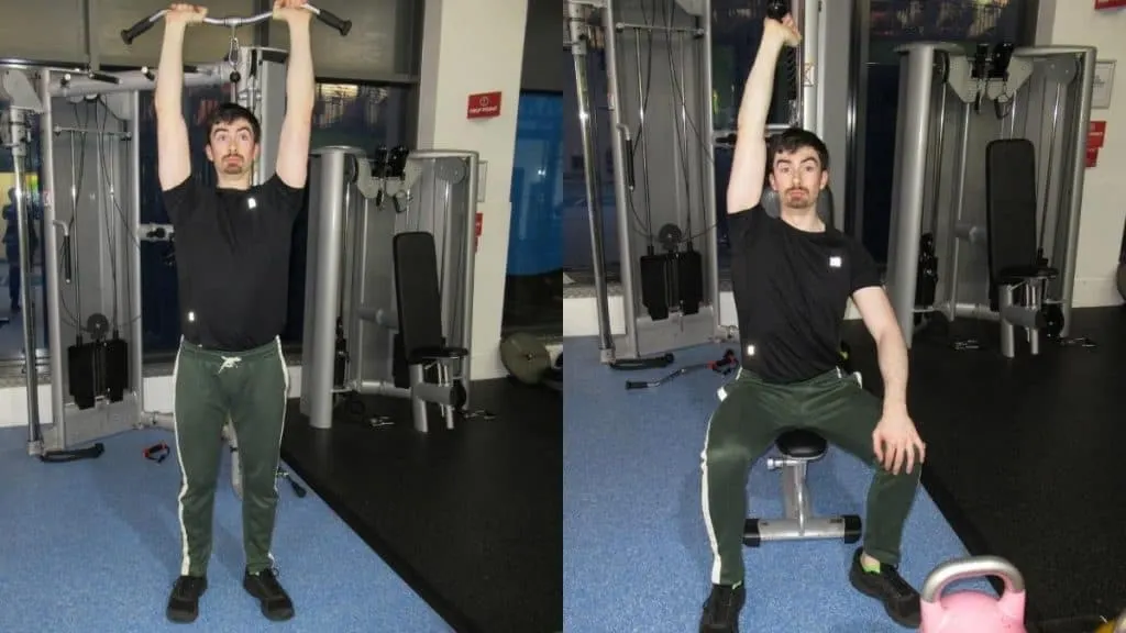 A man trying out some tricep equipment at the gym