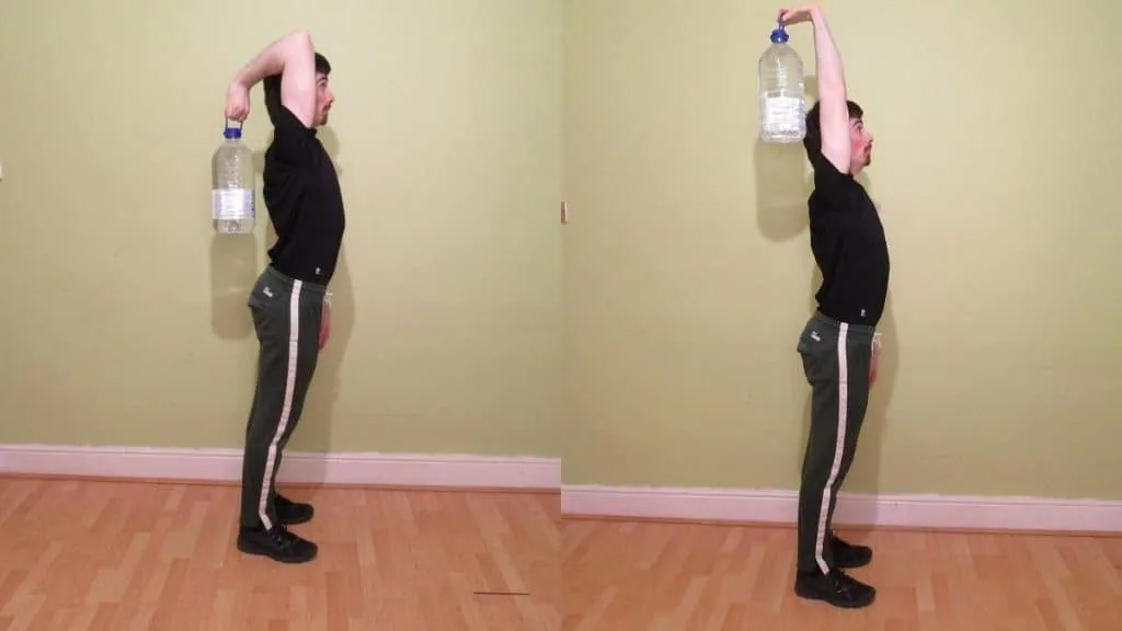 A man doing a water bottle overhead extension