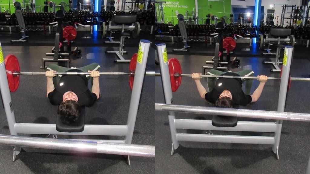 A weight lifter performing a wide vs narrow bench press comparison at the gym
