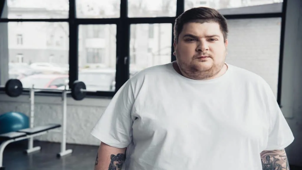 An obese man with a 24 inch neck