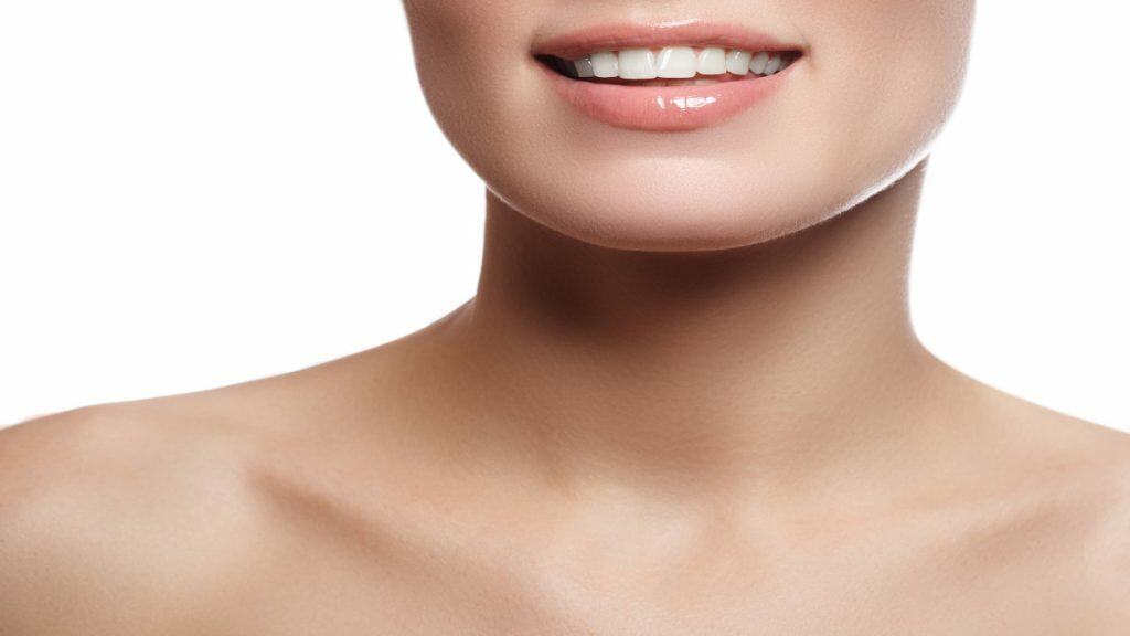 Close up of a woman's fourteen inch neck