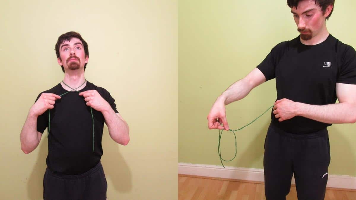 A man showing how to measure your neck size without a measuring tape