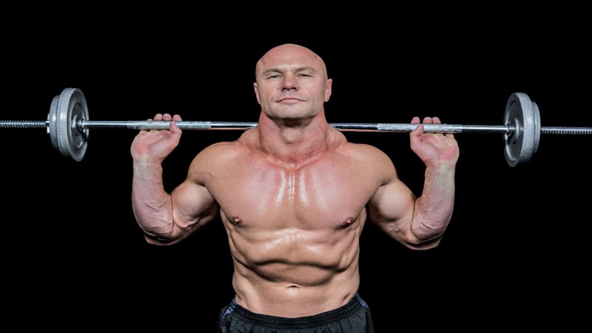 A bodybuilder showing his big 20 inch neck