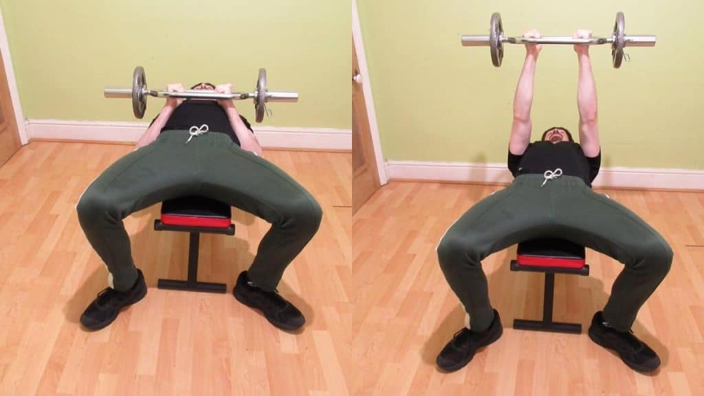 A weight lifter performing some triceps bar exercises