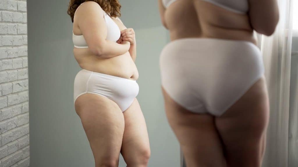 An obese woman with a 25 inch butt