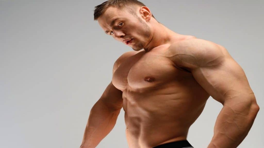 A bodybuilder showing his big 46 inch chest