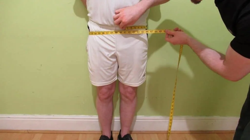 A male showing his very average hip circumference