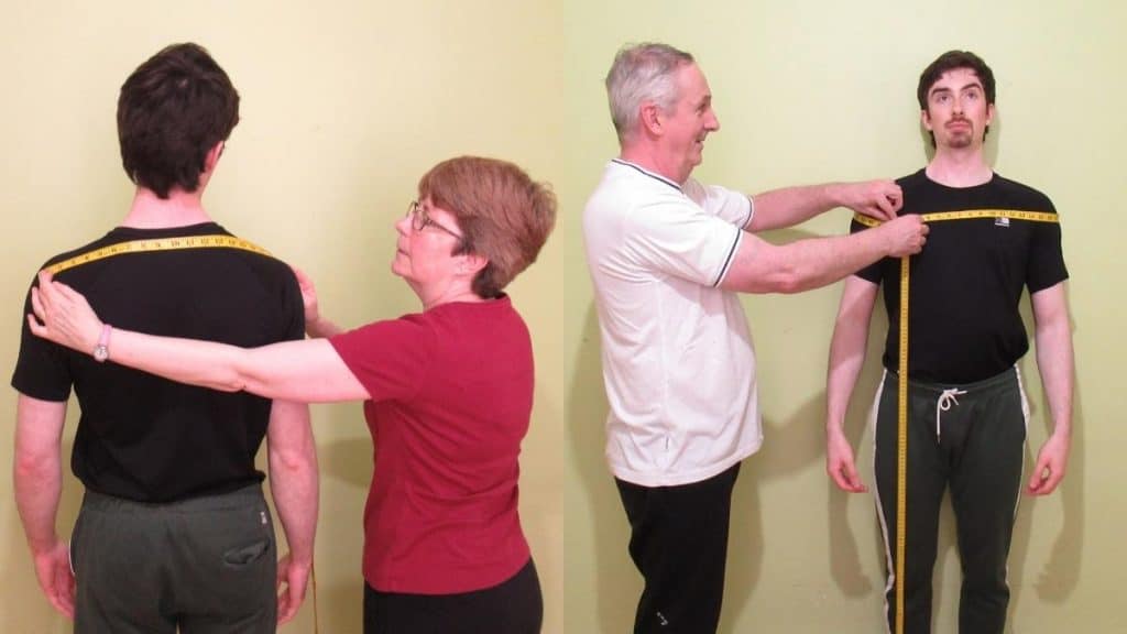 A man doing a shoulder width vs shoulder length comparison to illustrate the differences