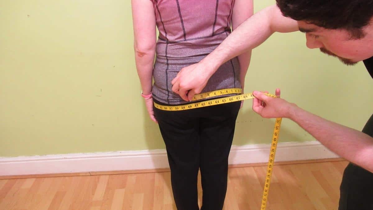 A person trying to find the average hip size for a woman