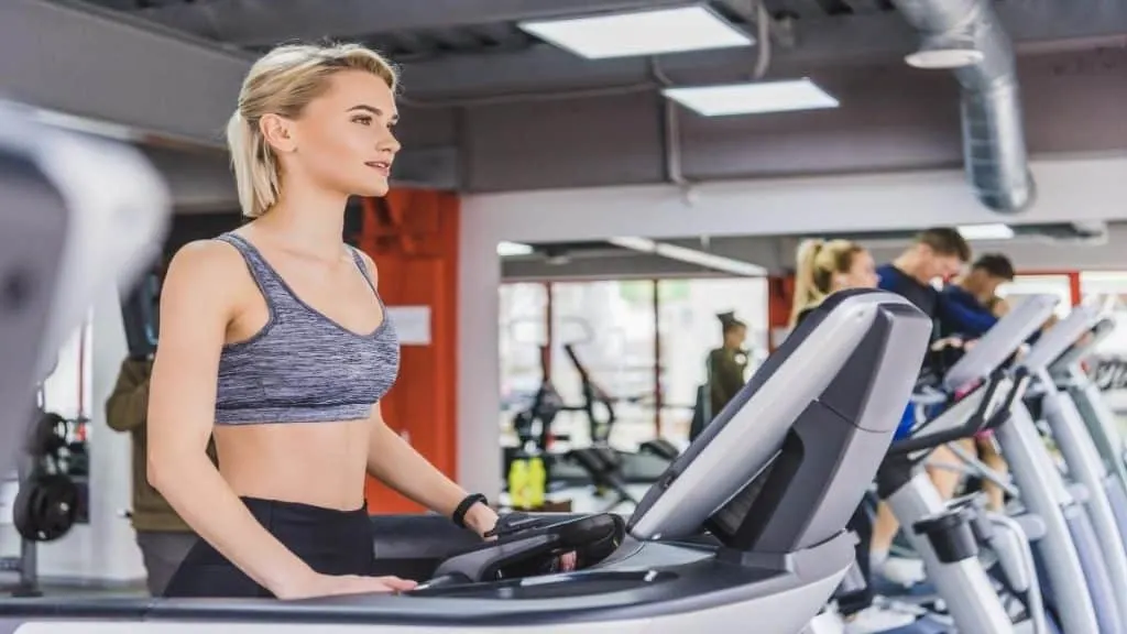 A woman using the treadmill