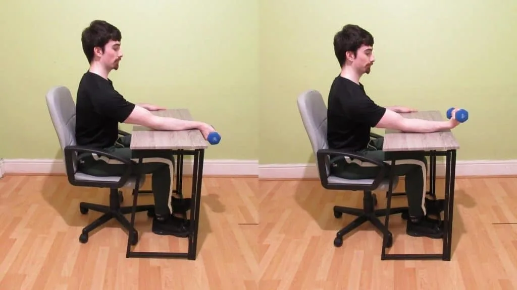 A man working his 2 inch wrists with weights