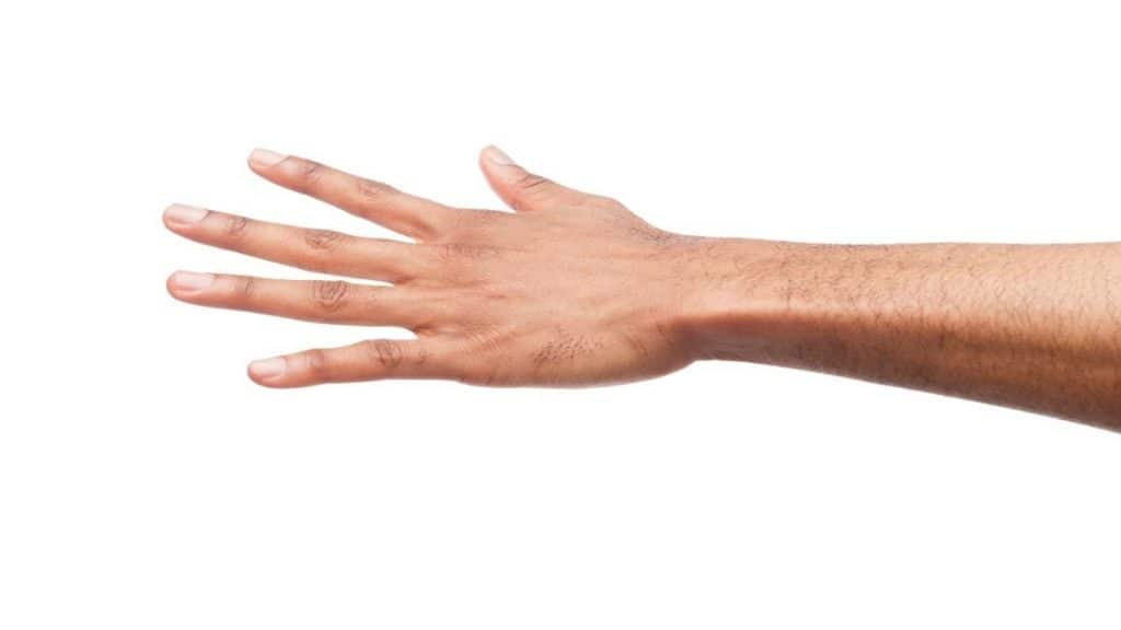 A man showing that he has a 3 inch wrist
