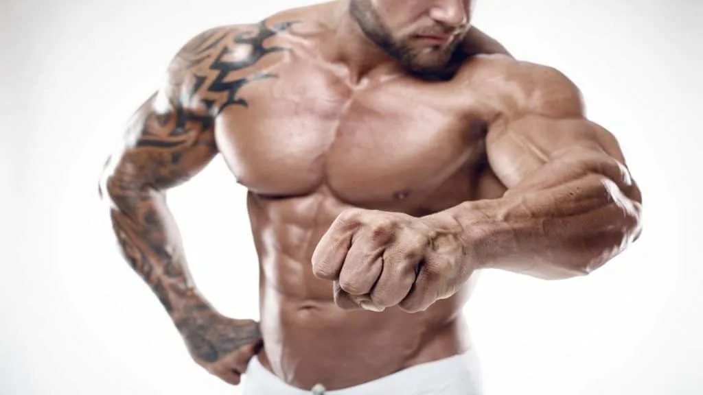 A bodybuilder showing his big 6 inch wrist to the camera