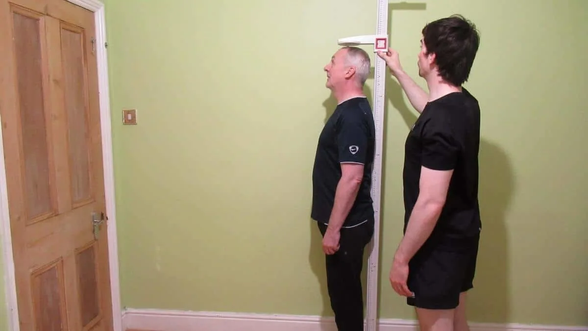 A man trying to figure out if you can grow taller after 40