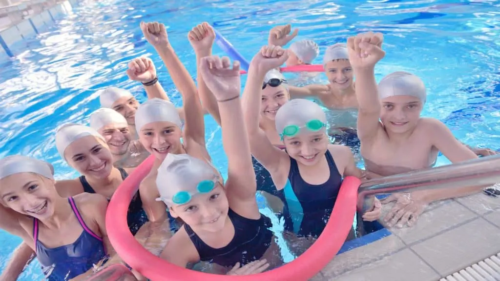 Happy children swimming