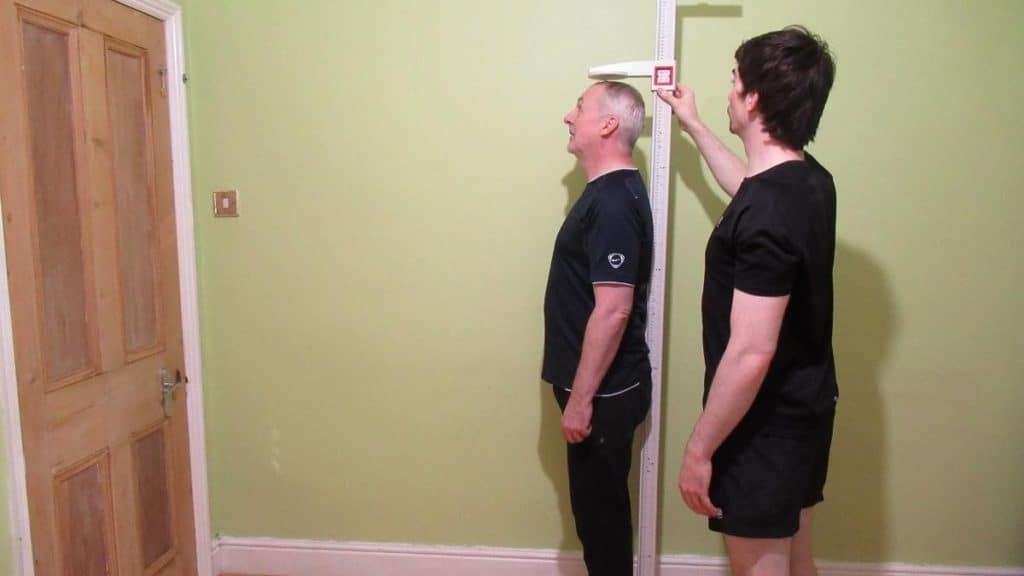 A man demonstrating how to get taller naturally